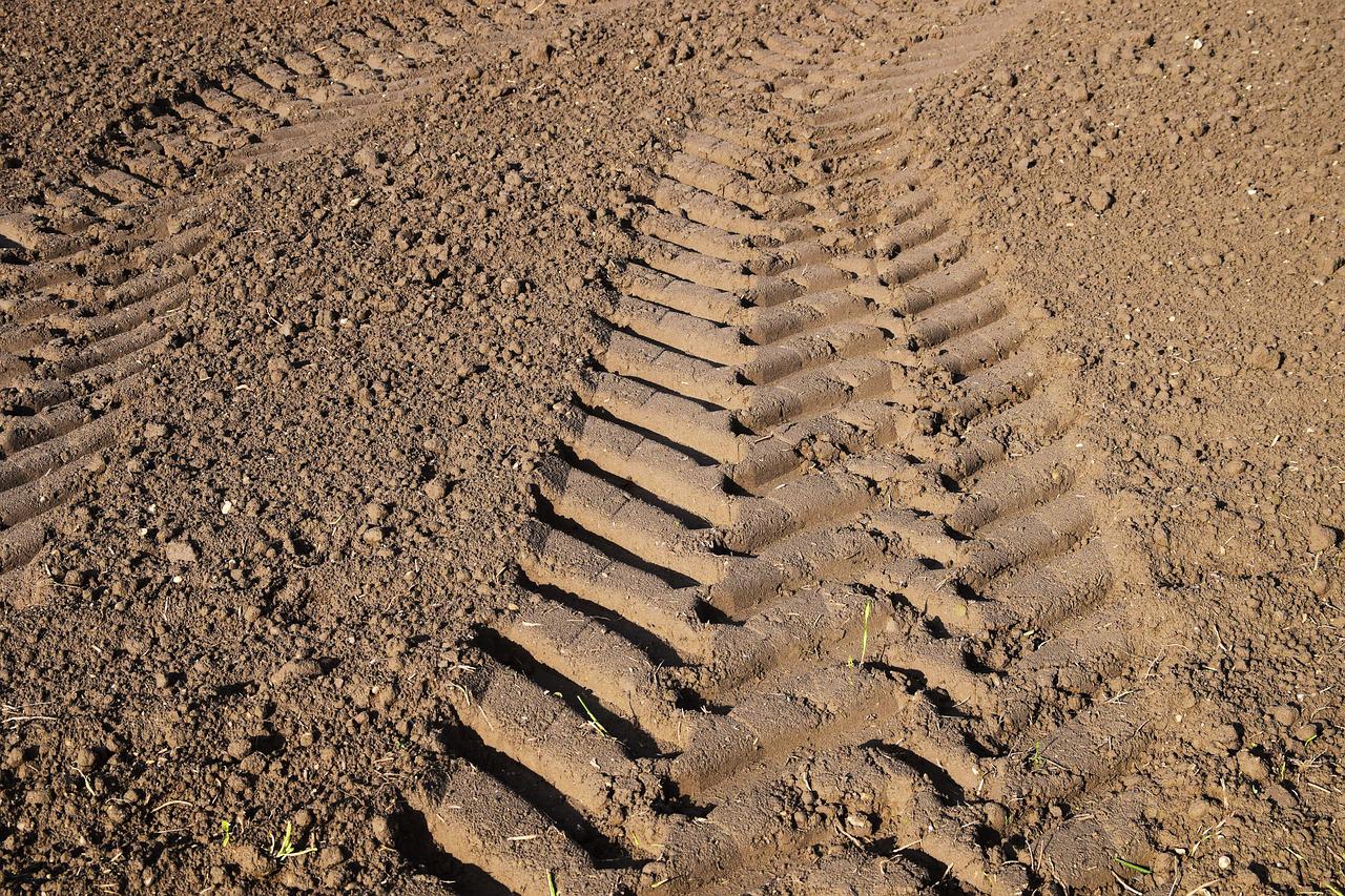 Image of road soil and tractor tread
