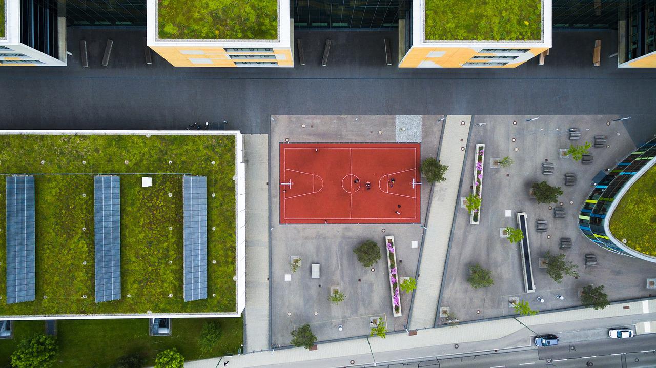 Birds eye view of a parkland in a busy city