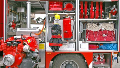 image of an open fire engine with gear on display