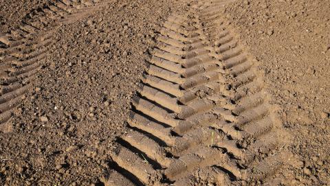 Image of road soil and tractor tread