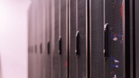 Detailed view of network server racks in a modern data center, highlighting technology infrastructure. Image on Pexels courtesy of Brent Sayles