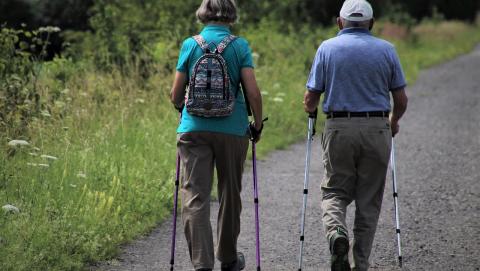 image of two seniors on a walk