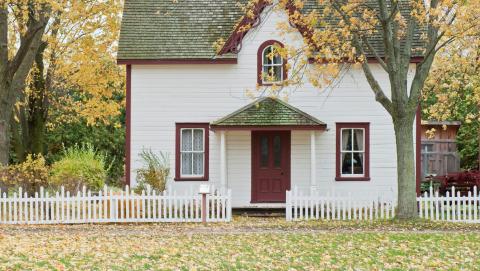 An image of a white house with a red door in London, Ontario courtesy of Scott Webb